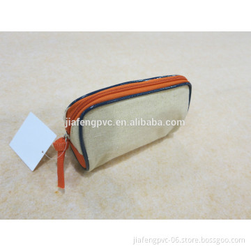 Fashional canvas pouch with golden spangles and colored piping